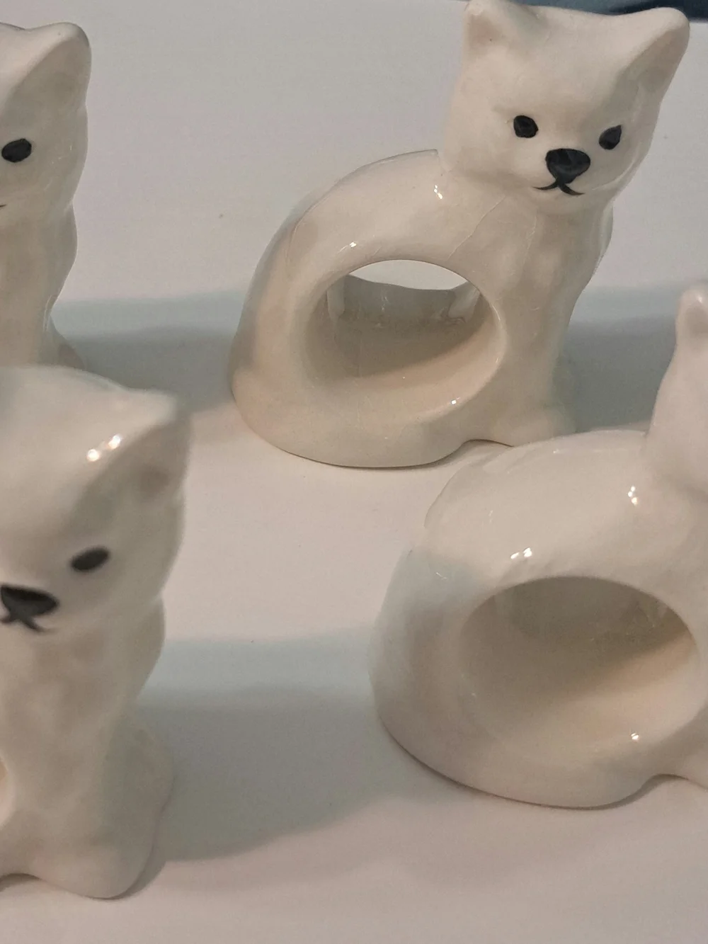 Vintage White Ceramic Porcelain Cat Napkin Rings - Set of 4 One Has Small Chip.